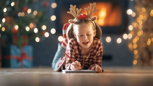 girl-is-writing-the-letter-to-santa-2023-11-27-05-29-53-utc (1)