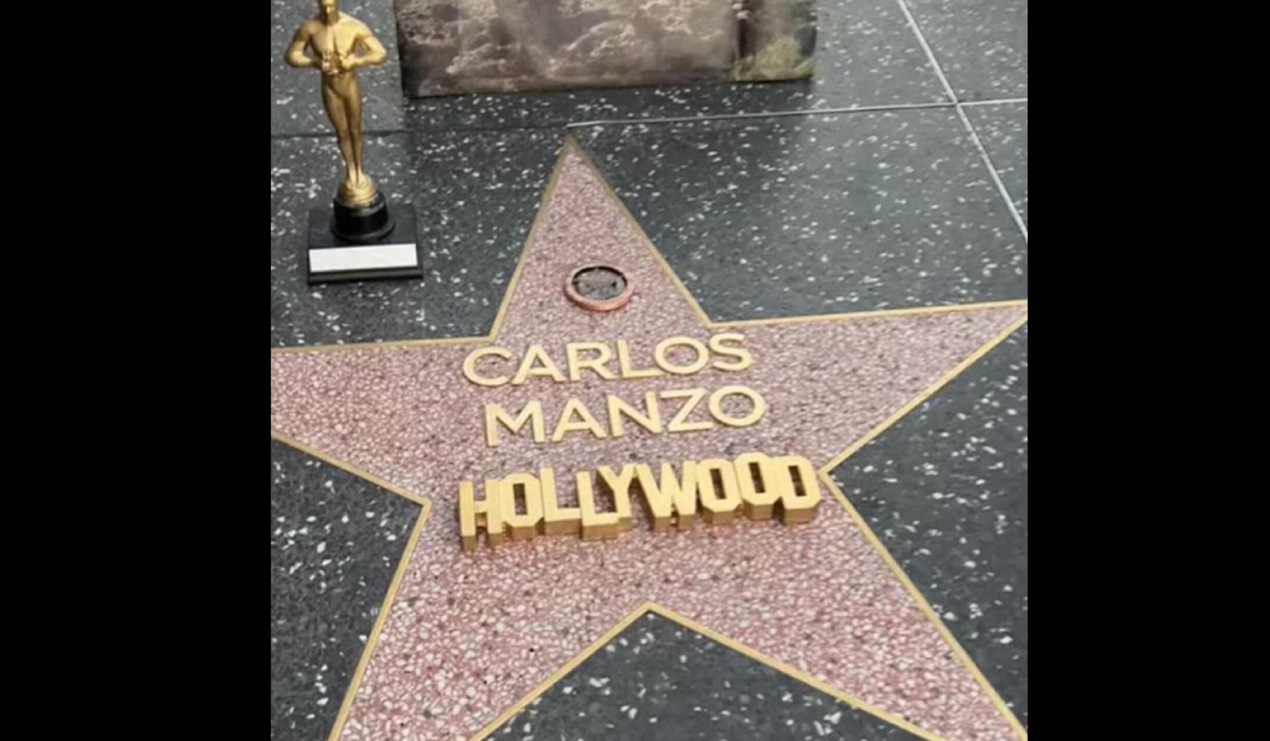 carlos manzo estrella.jpg