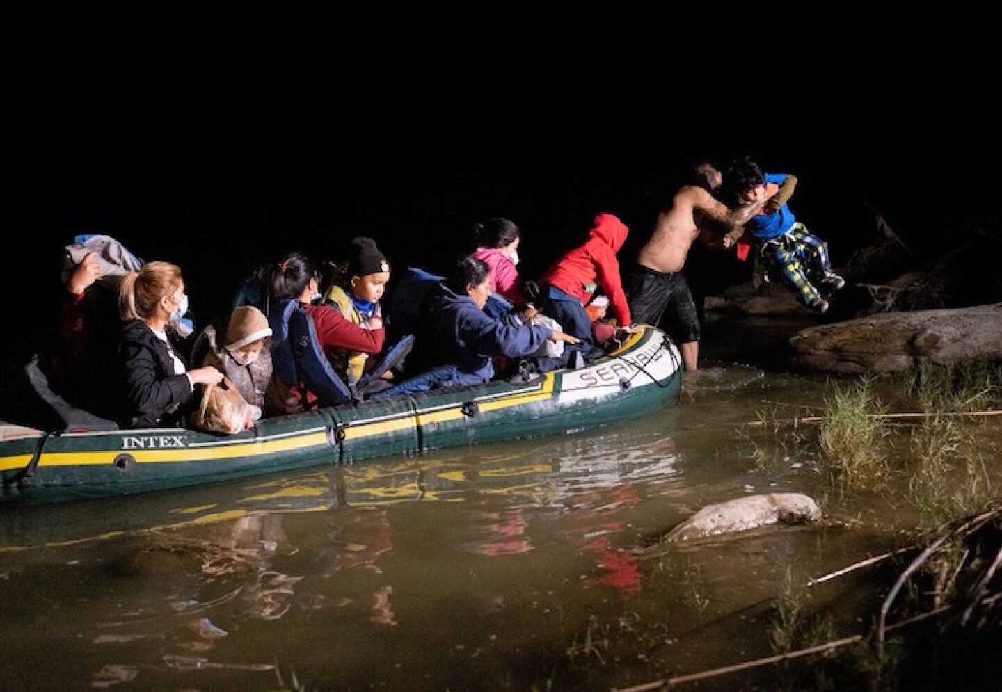 Migrants Cross Into Texas From Mexico