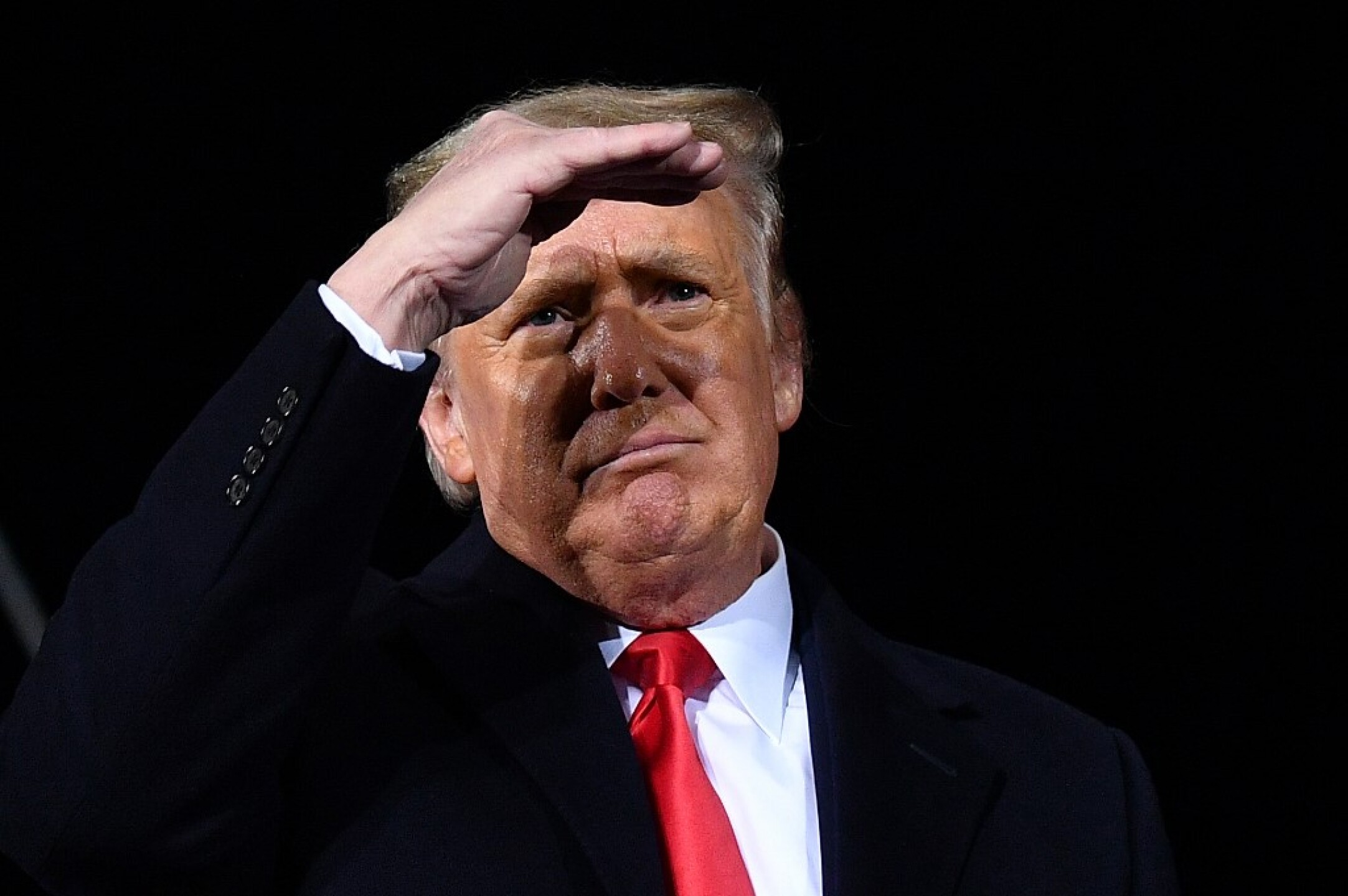 Trump holds rally on eve of twin runoffs in Georgia which will determine control of Senate