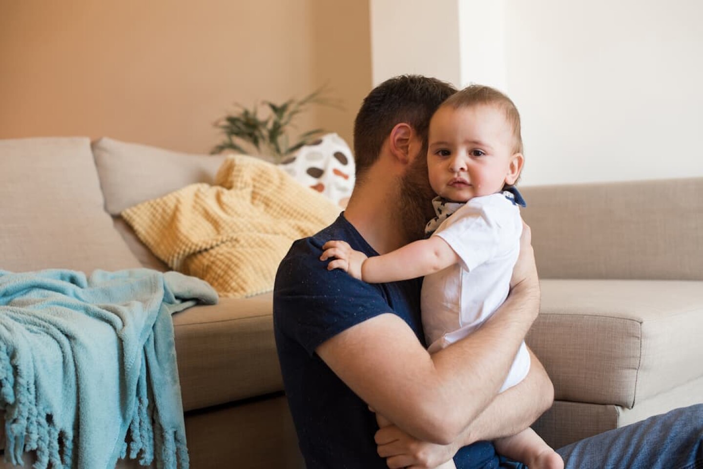 father-comforting-crying-baby-2023-11-27-05-24-24-utc (1)
