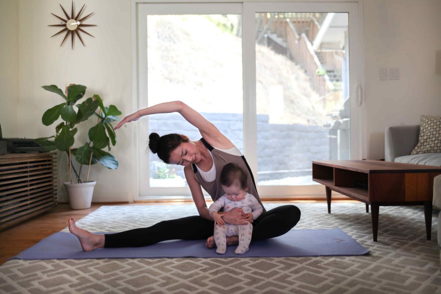 toddler-daughter-with-mom-doing-yoga-at-home-2022-10-31-22-08-36-utc (1)