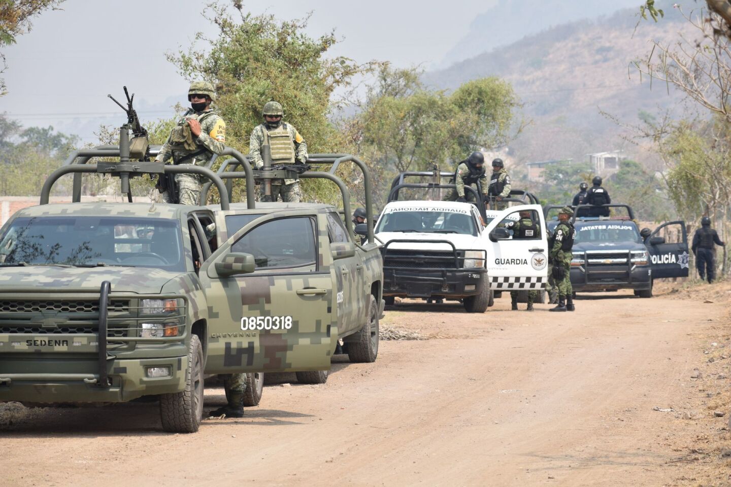 Operativo de seguridad por parte de la policía Estatal y la Guardia Nacional tras la emboscada a integrantes de Unión de Pueblos y Organizaciones del Estado de Guerrero (UPOEG). FOTO: DASSAEV TÉLLEZ ADAME /CUARTOSCURO.COM