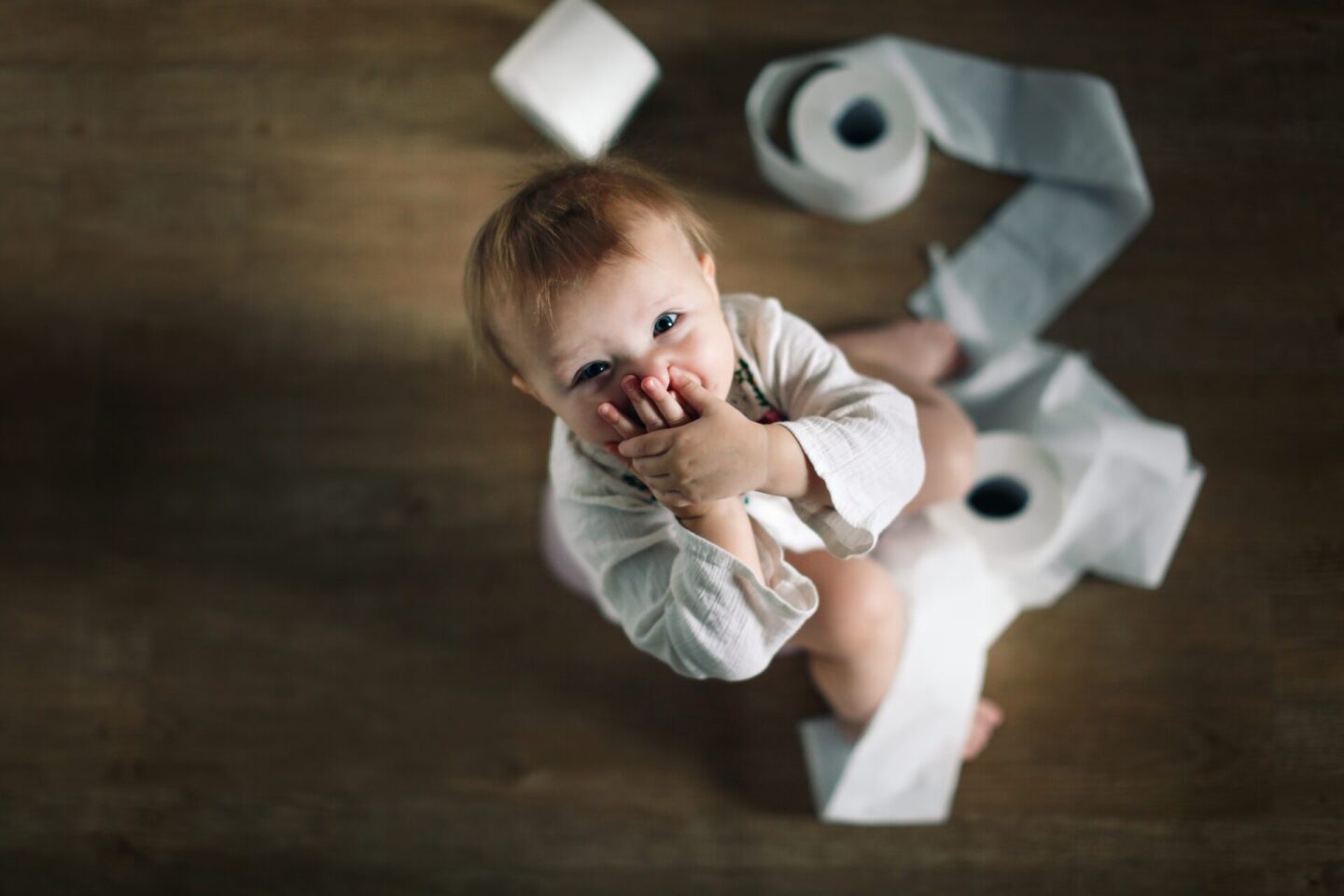 child-on-pot-with-a-lot-of-rolls-toilet-paper-to-2021-09-02-20-06-33-utc