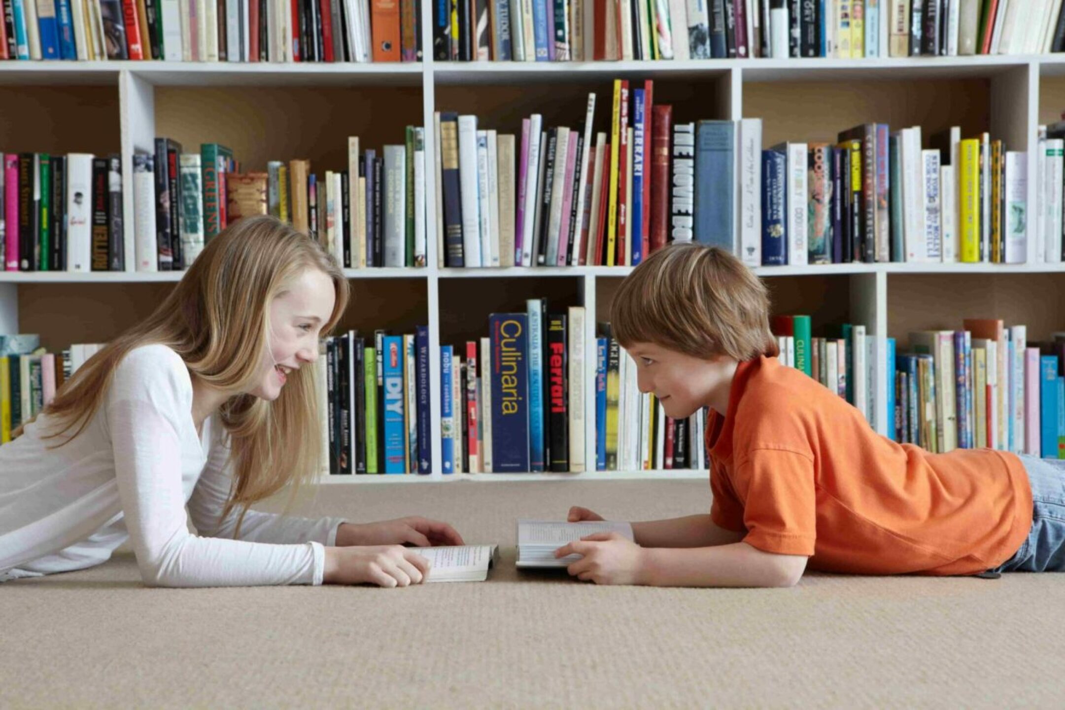 children-reading-by-bookshelves-2022-03-08-00-16-01-utc-1-1280x853