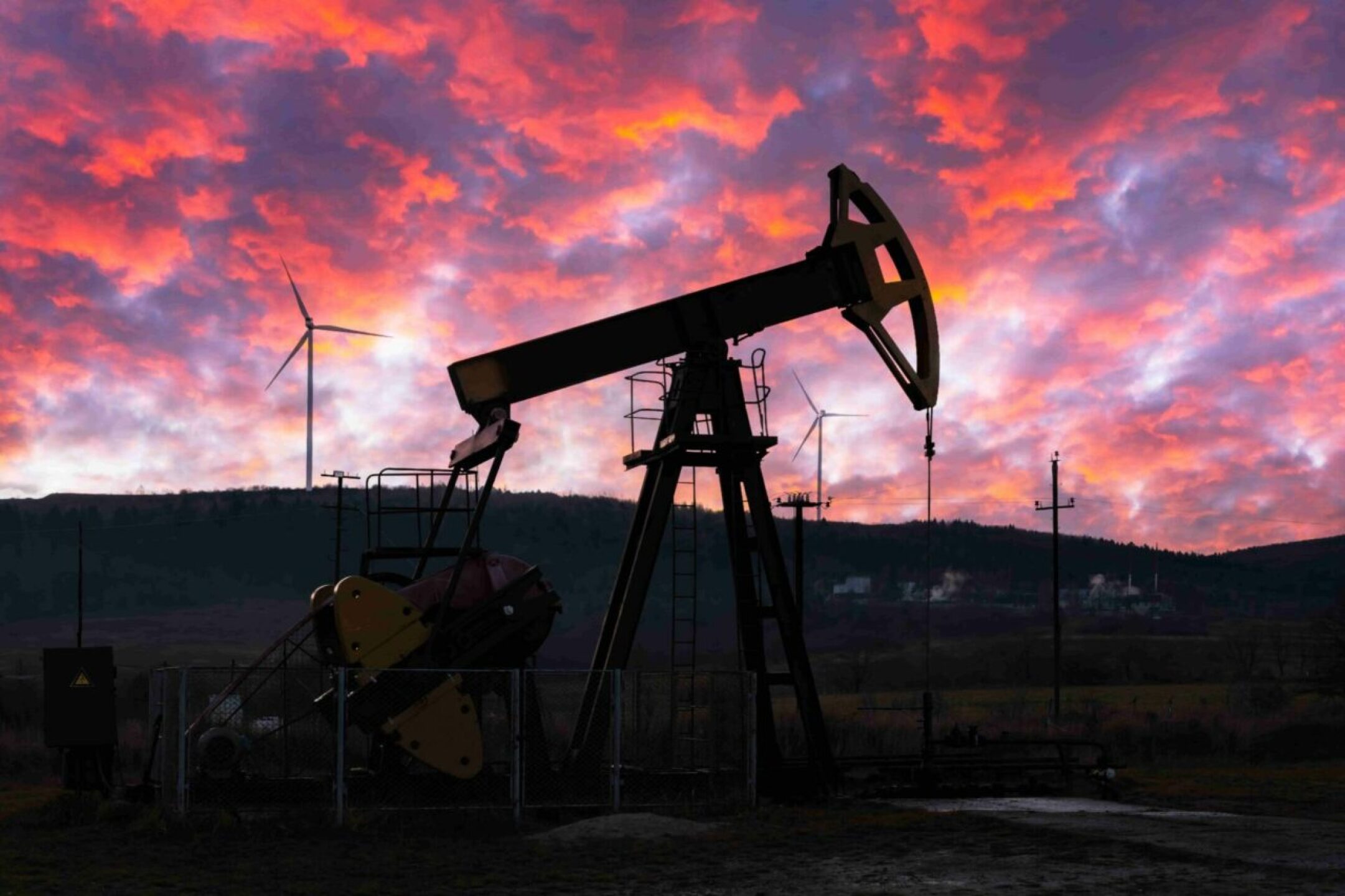 oil-pump-and-wind-turbines-against-incredible-purp-2021-12-17-04-14-08-utc-1-1280x853