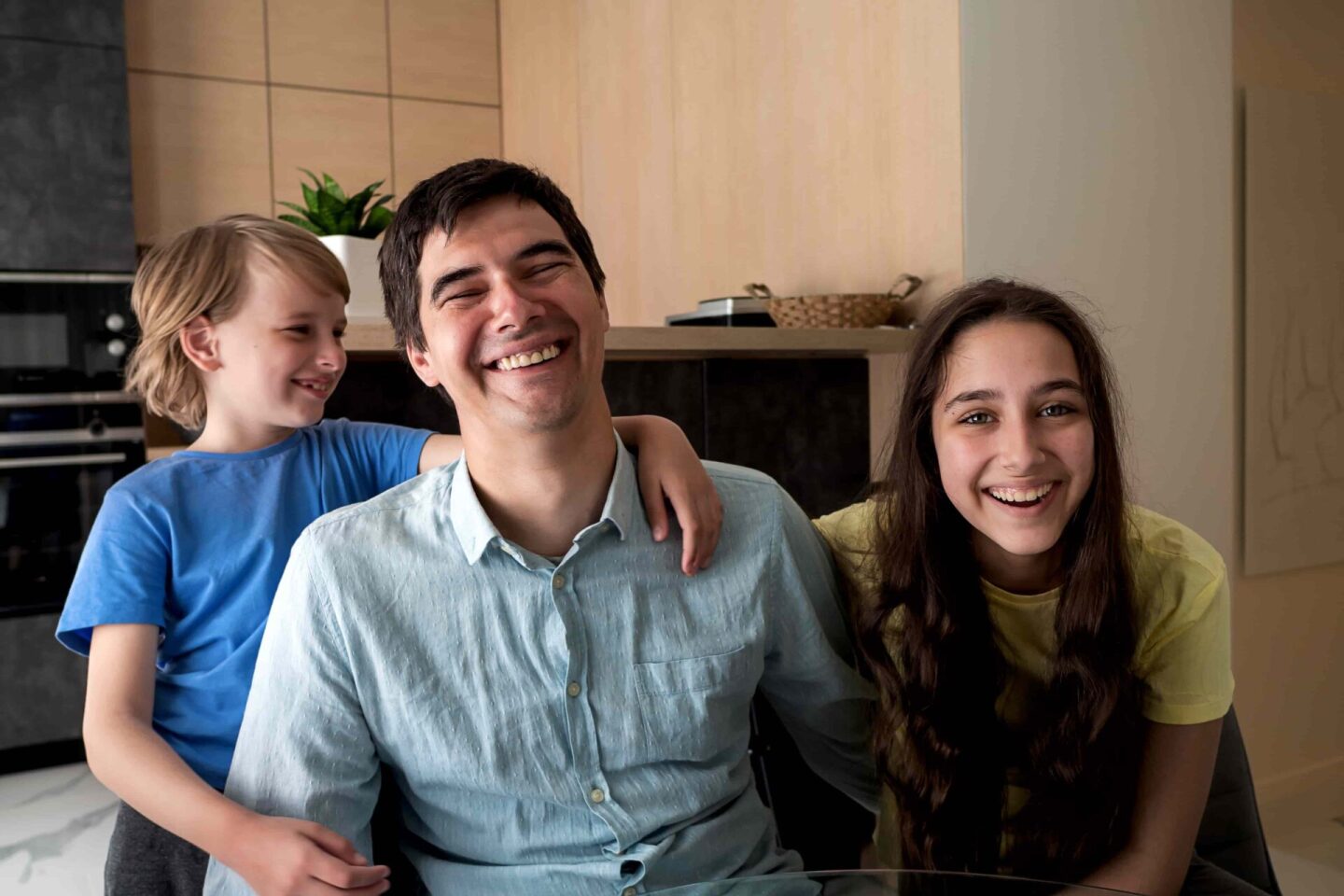 happy-family-dad-with-children-at-home-in-the-kit-2022-11-03-12-35-08-utc (1)