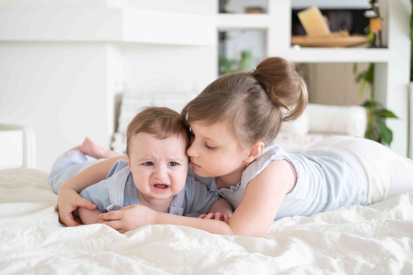cute-little-girl-older-sister-comforting-her-cryin-2022-11-09-08-52-50-utc (1)