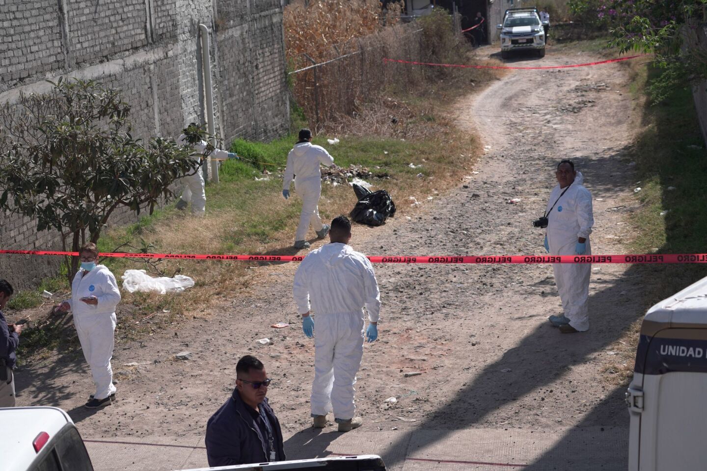 Fue hallada un cadáver embolsado en un camino de terracería de la colonia Ampliación Gertrudis Sánchez.