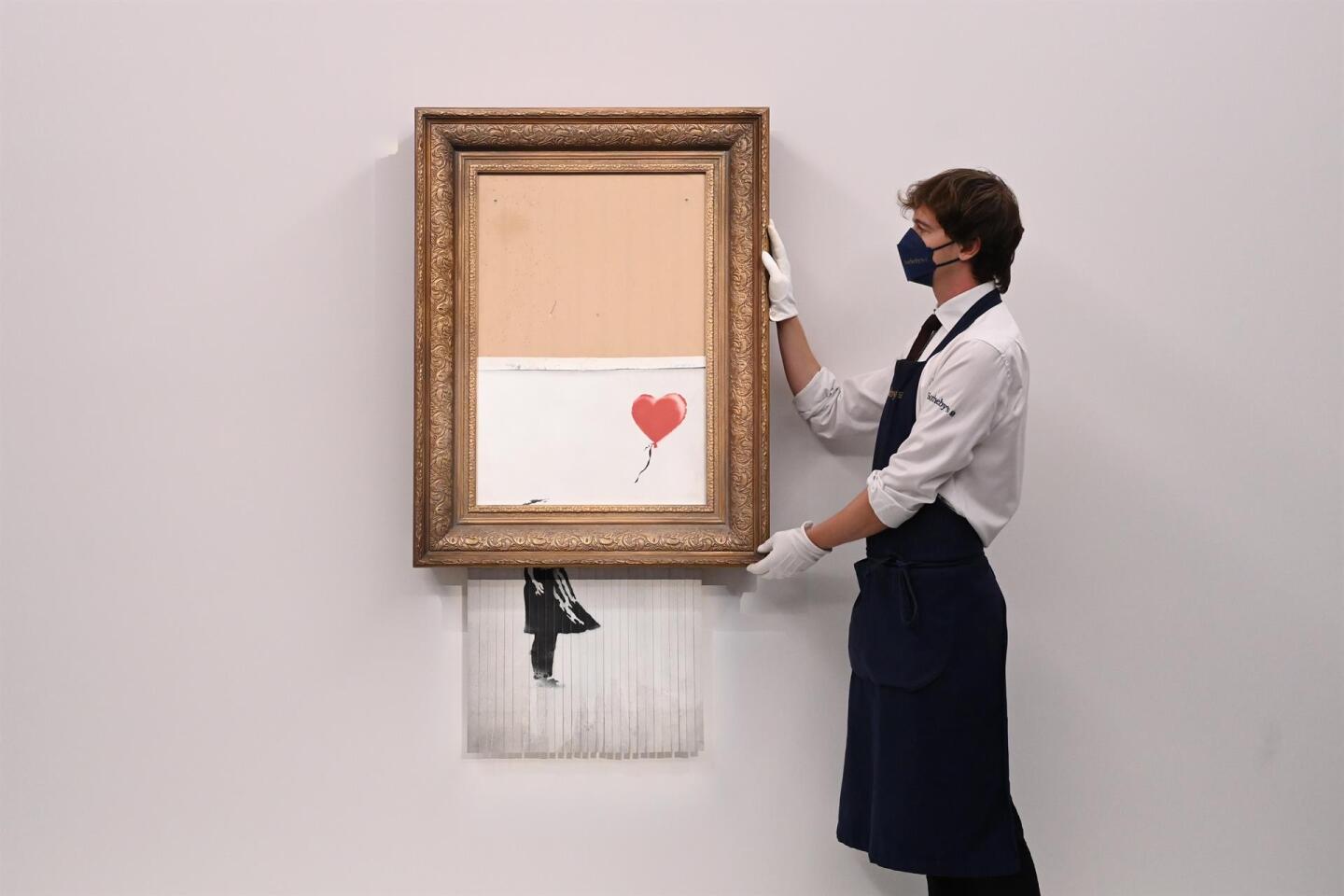 banksy_cuadro_autodestruido_niña_con_globo