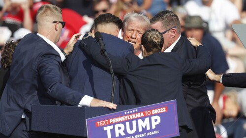 Former US President Donald Trump rushed off stage after incident at campaign rally