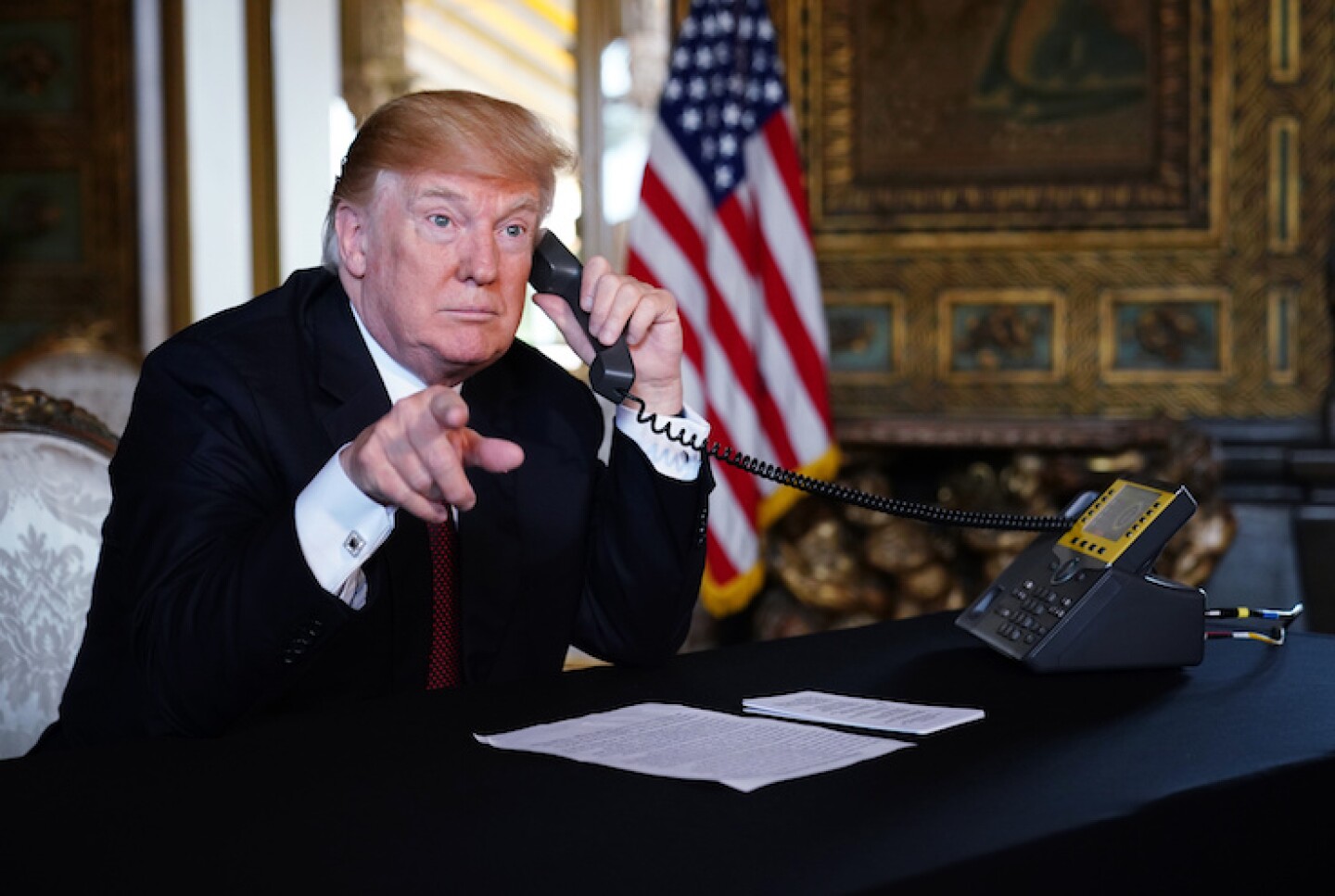 US President Donald Trump speaks to military members via teleconference on Thanksgiving