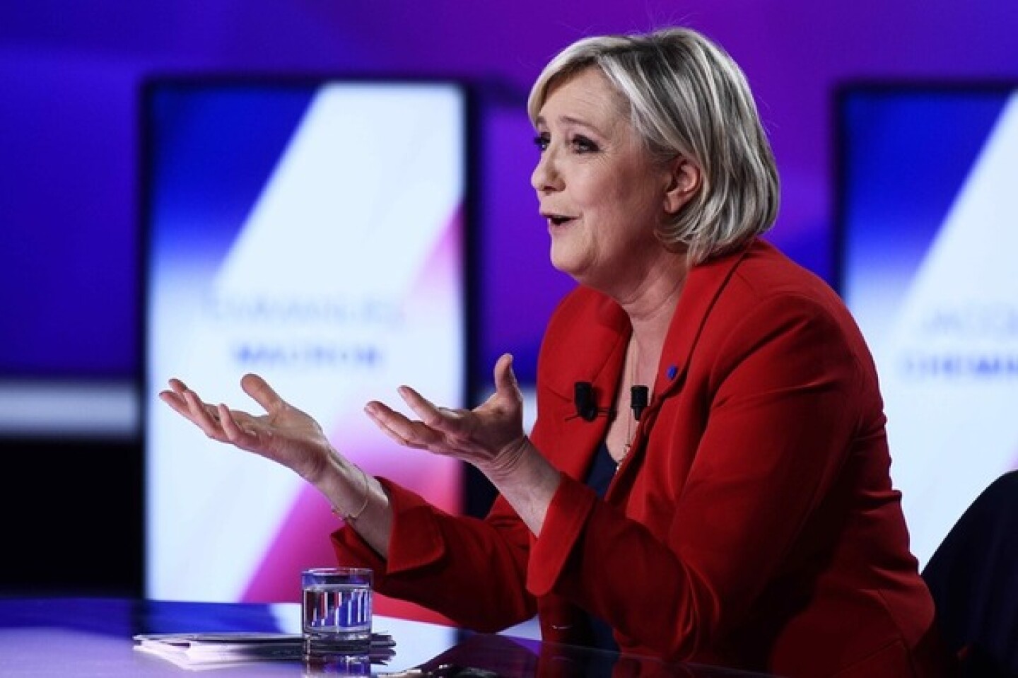 Marine Le Pen, French National Front (FN) political party leader and candidate for French 2017 presidential election, attends the France 2 television special prime time political show, "15min to Convince" in Saint-Cloud