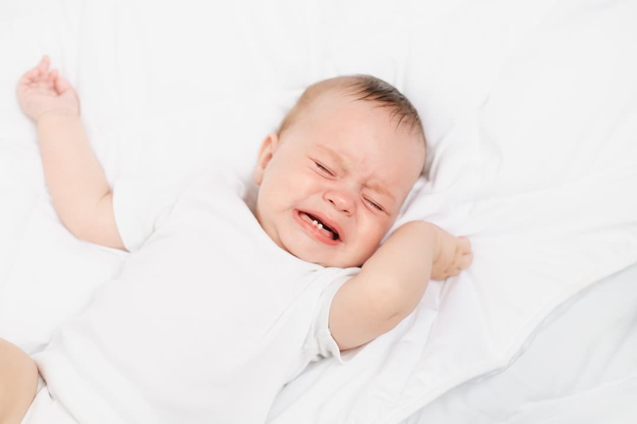 the-baby-is-crying-in-his-crib-the-baby-s-teeth-2023-11-27-04-56-14-utc-1