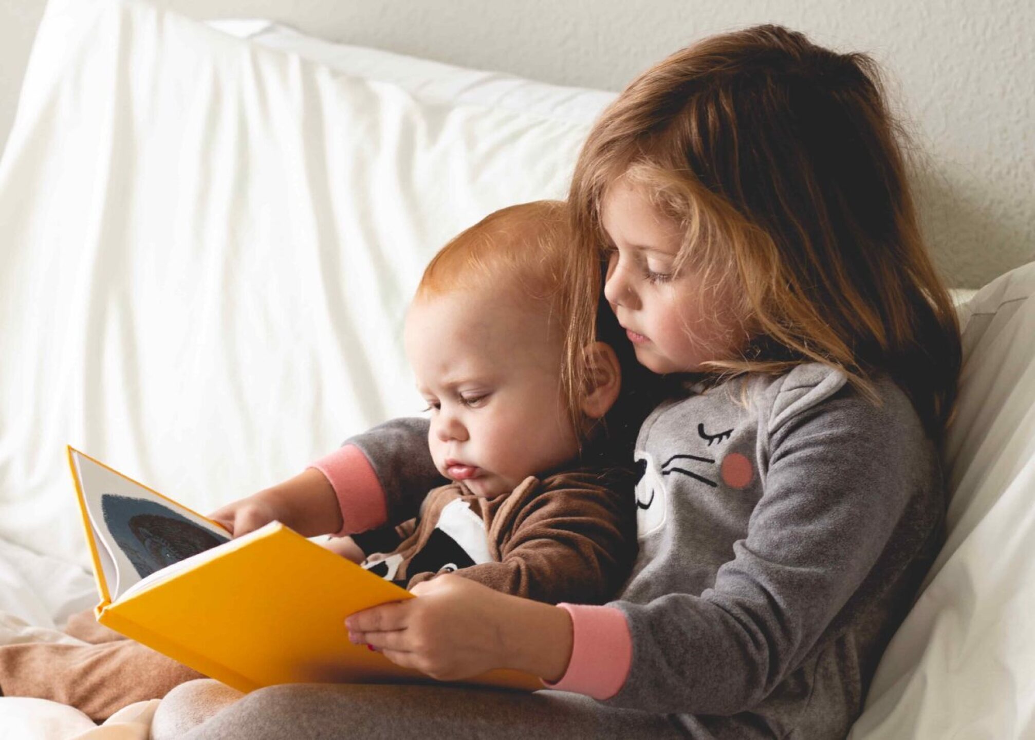 children-reading-a-book-2022-11-02-04-18-59-utc-1-1280x915
