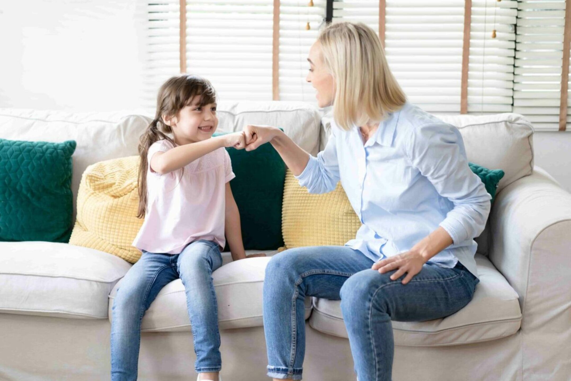 happy-mother-and-daughter-with-pleasant-smile-gree-2023-01-21-01-46-31-utc-1-1280x855