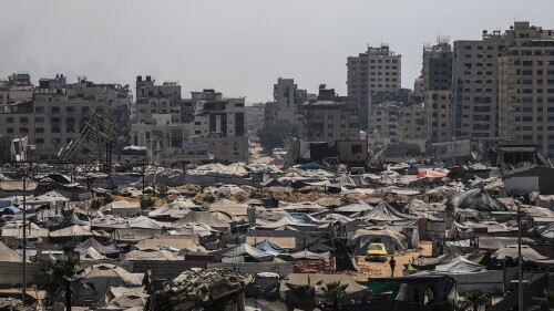 Displaced Palestinians live in tents after fleeing Gaza's north