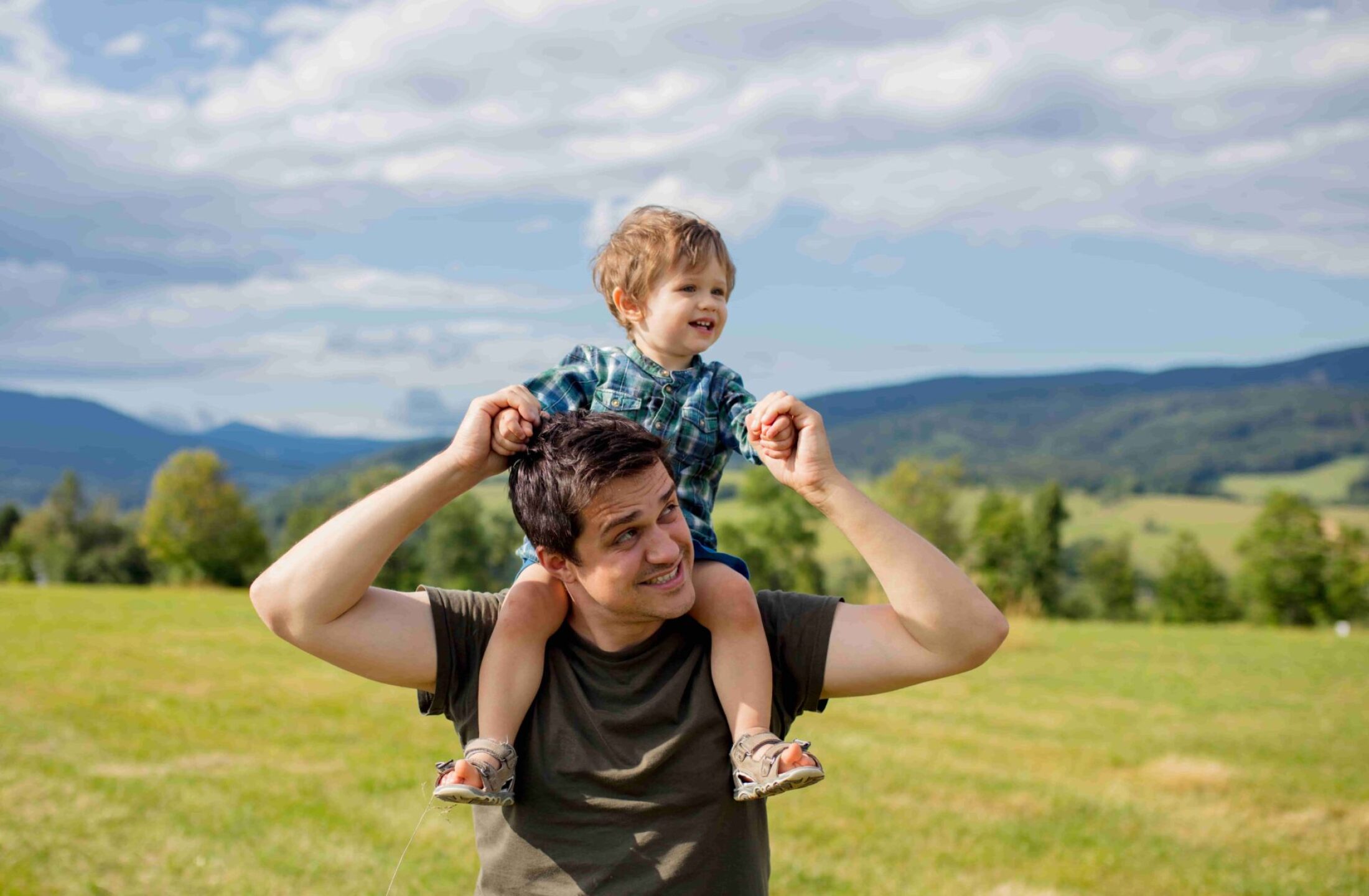 father-and-toddler-boy-have-a-fun-in-a-mountains-2022-01-11-21-47-00-utc-1