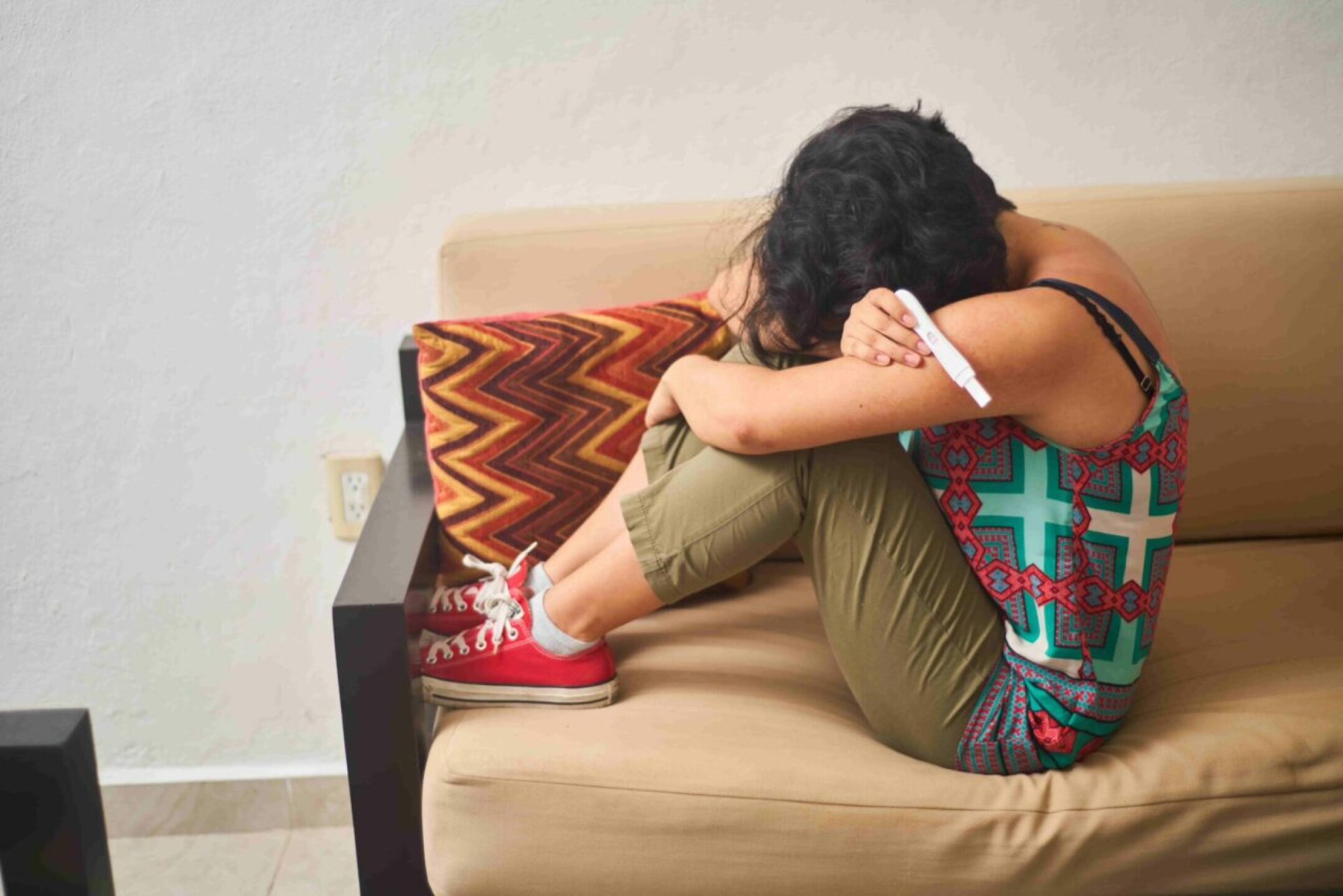 young-latin-woman-sad-about-pregnancy-test-result-2023-06-12-15-58-13-utc-1-1280x854