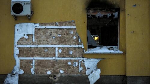 Group of people tries to steal mural by street artist Banksy in the town of Hostomel, Kyiv region