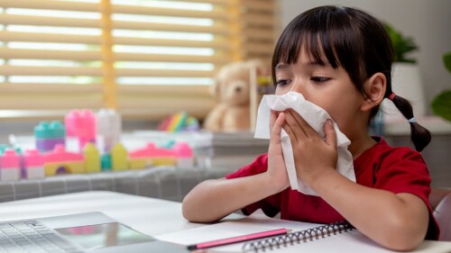 unhealthy-kid-blowing-nose-into-tissue-child-suff-2023-11-27-04-51-04-utc (1)