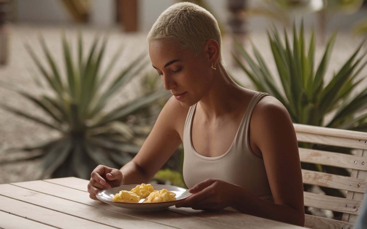 huevo a-photo-of-a-woman-with-short-hair-sitting-at-a-wo-sDg93JC-Rlm1P9CItvqIhQ-L6d4oqfRTjiN14w849FPwg.jpeg