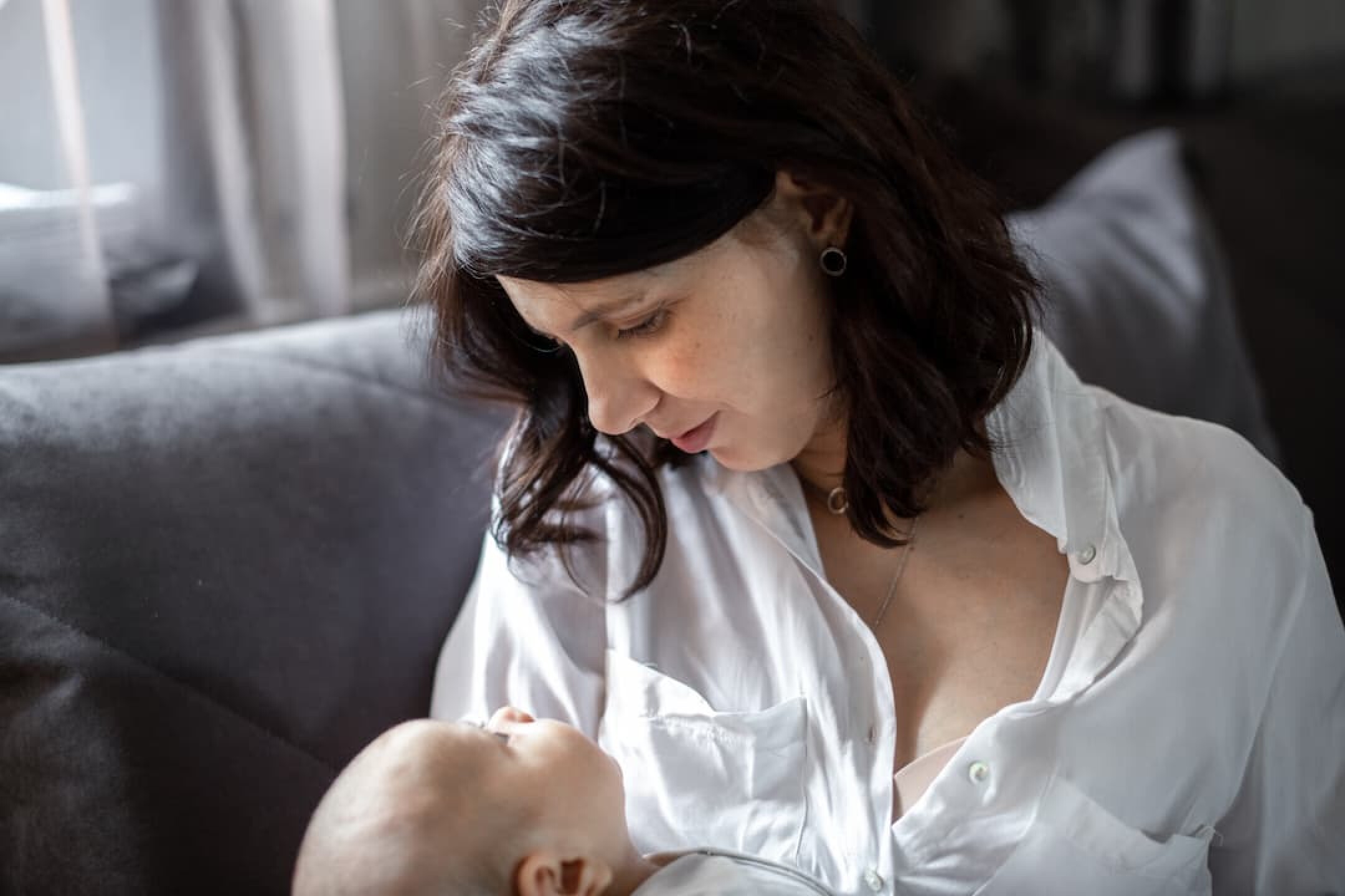mom-breastfeeds-the-baby-2023-11-27-05-24-06-utc-1
