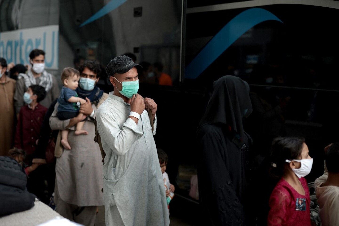 Afghan Refugees Arrive At Dulles Airport After US Pulls Out Final Troops