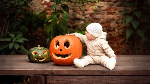 small-baby-girl-with-pumpkins-2022-11-16-13-45-05-utc (1)