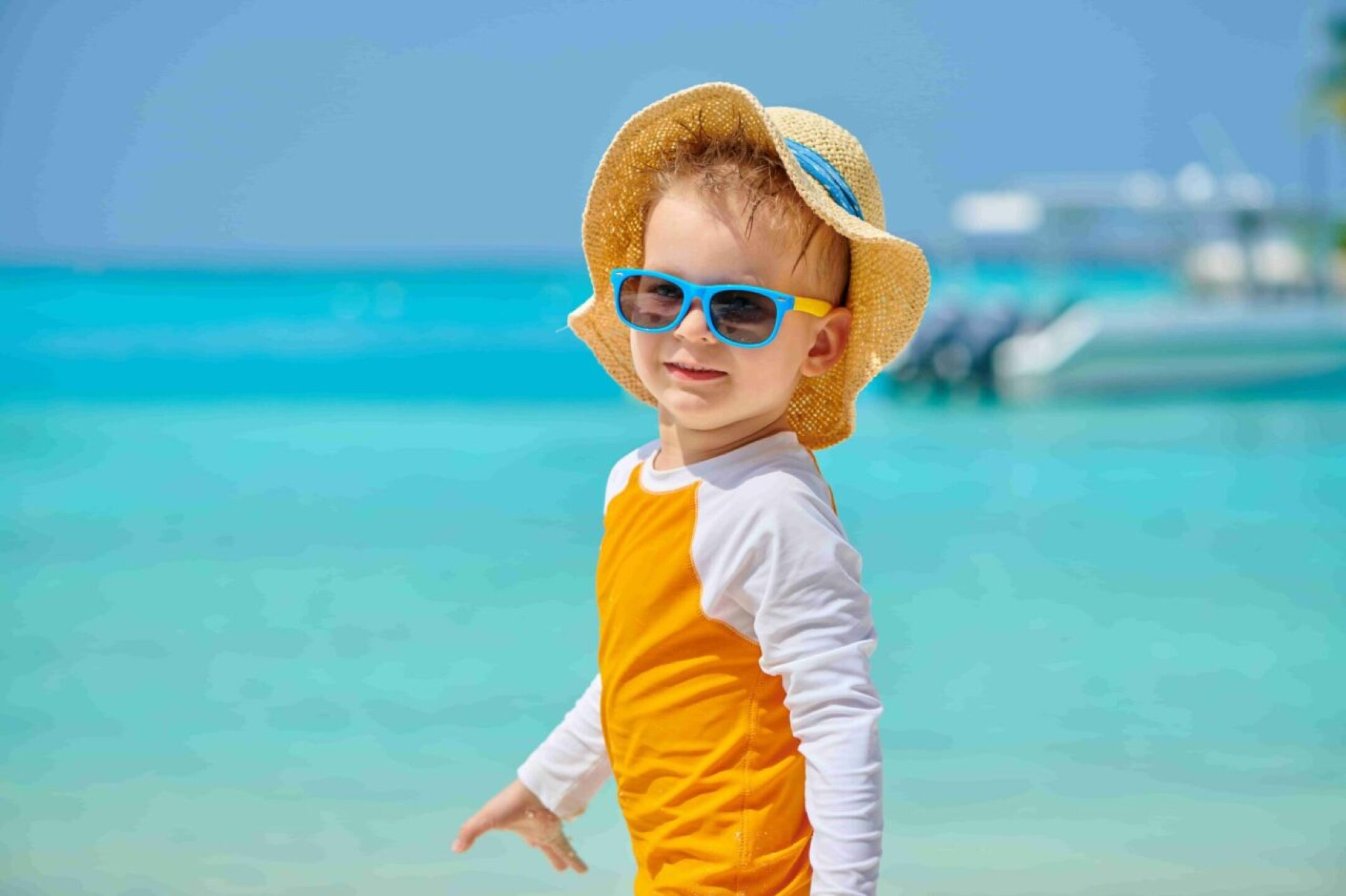 toddler-boy-with-sunglasses-on-beach-2021-08-26-16-19-35-utc-1-1280x853